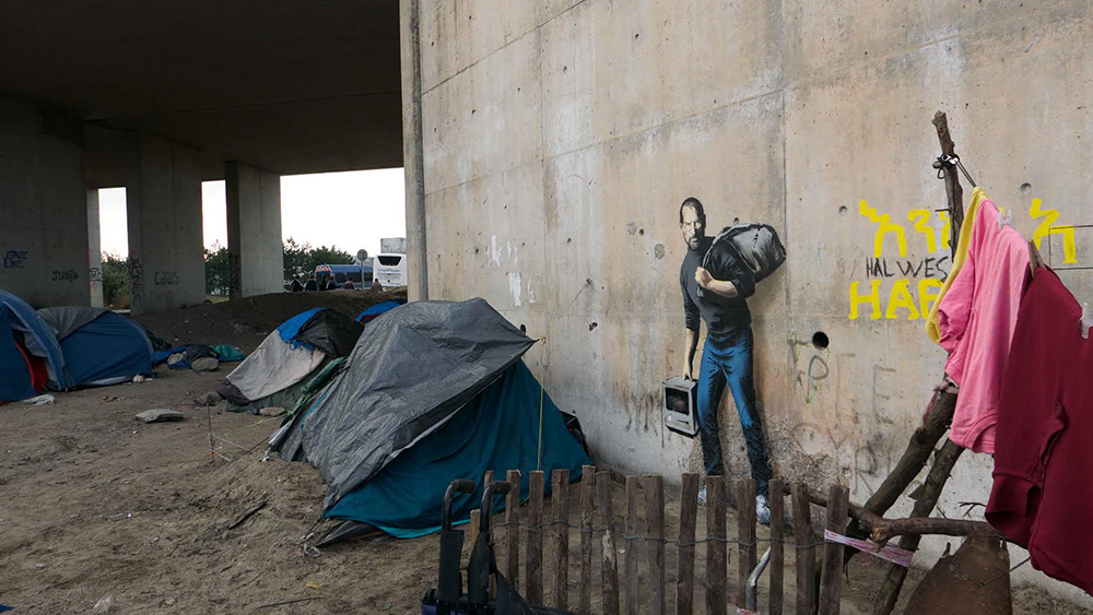 Banksy põe Steve Jobs num campo de refugiados