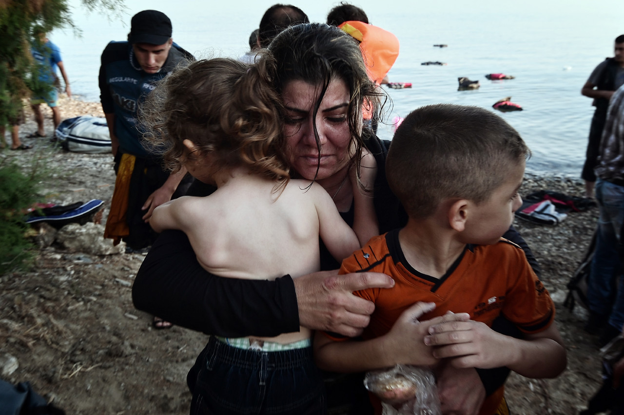 Imigrantes ou migrantes, tanto faz. Há um muro à sua espera